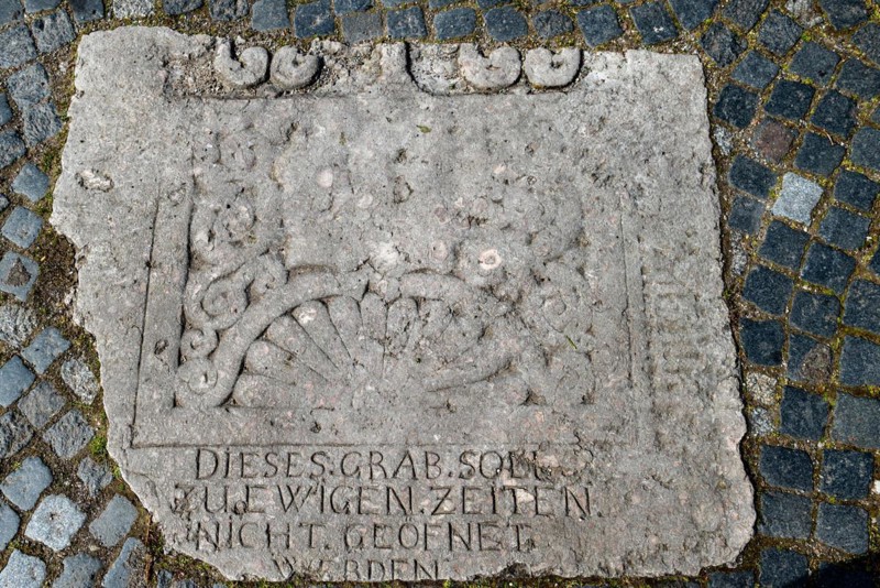 Historic gravestones in the pavement in front of St. Nicholas Church