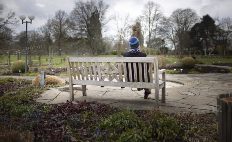 Subject: Pensioner on a park bench in Westfalenpark in Dortmund