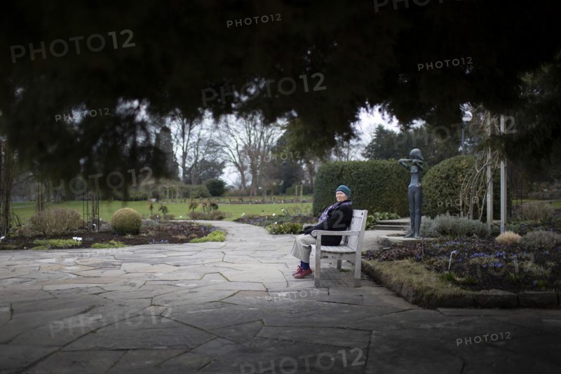 Subject: Pensioner on a park bench in Westfalenpark in Dortmund
