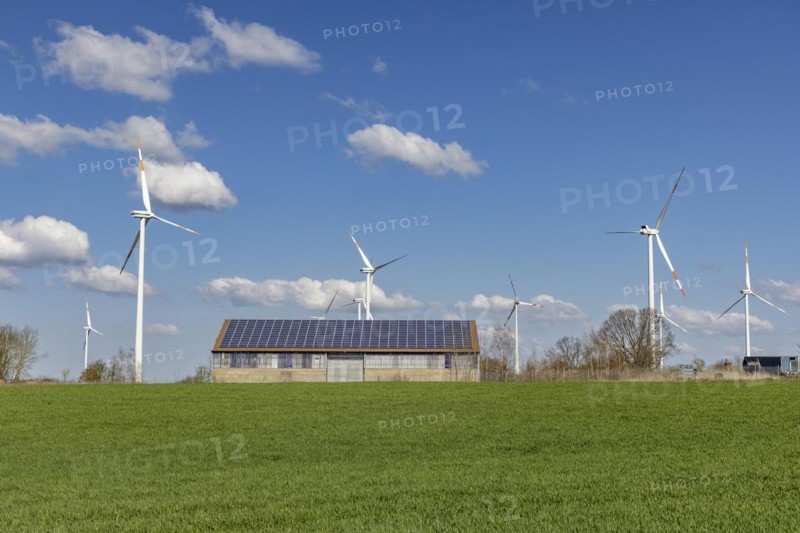 Solar modules on a stable and wind turbines in Brandenburg