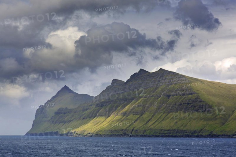 Sea cliffs along the rugged coast of Eysturoy