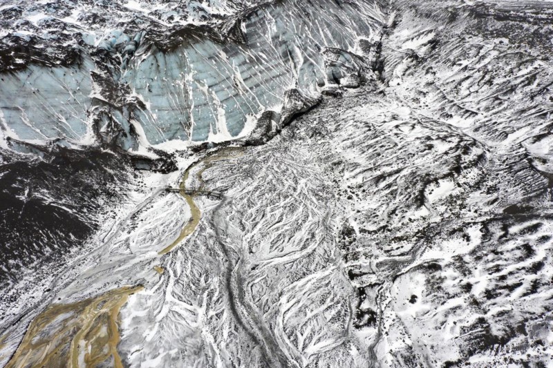 Aerial view over the glacial Virkisa River basin along the Glacier Falljoekull in winter in Austurland