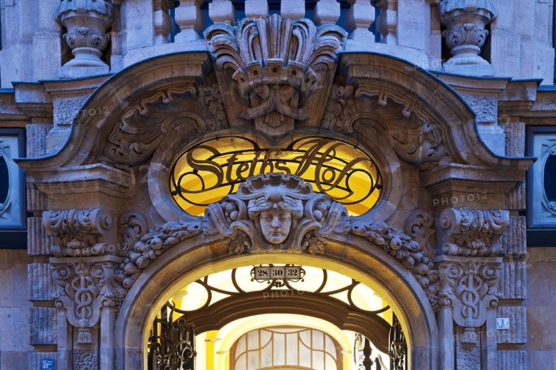 Neo-baroque architectural decoration on the portal of Steibs Hof at the blue hour