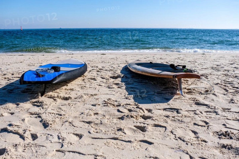 Two surfboards on the beach of Hoernum on the island of Sylt