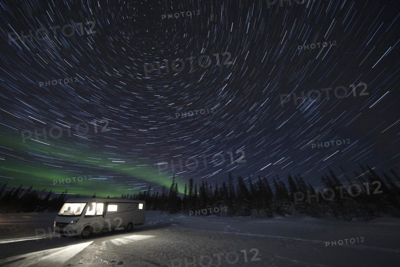 Camping with a camper van under star trails in Pallas Yllaestunturi National Park