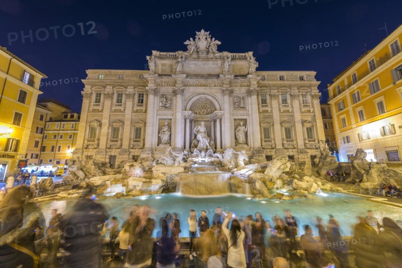 Trevi Fountain at Night in City Square in Rome