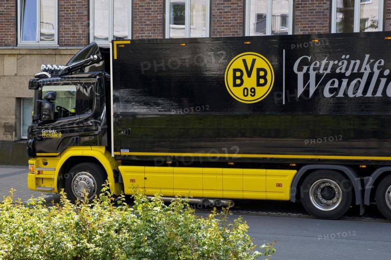 Black and yellow truck with drinks with Borussia Dortmund club emblem