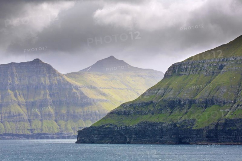 Sea cliffs along the rugged coast of Eysturoy