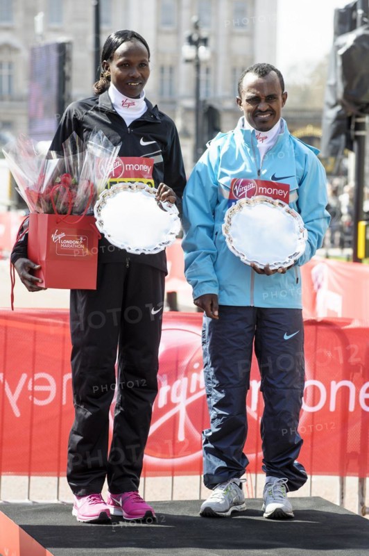 Elite mens and womens winners Tsegaye Kebede and Priscah Jeptoo at the Virgin London Marathon Medal Presentations on 21.04.2013 at The Mall