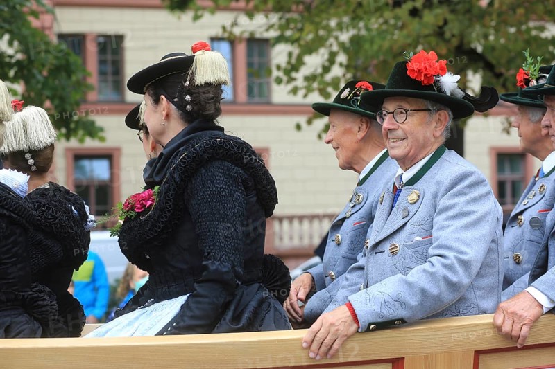 Participants in the Oktoberfest Tentowners' and Brewery Parade pass by at the start of the event. Munich