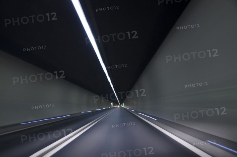 Illuminated narrow tunnel