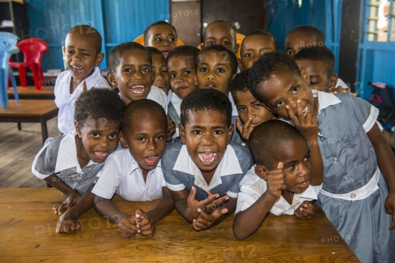 Very happy school children in a school