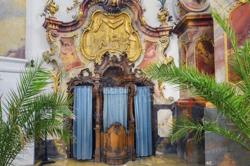 Richly carved confessional