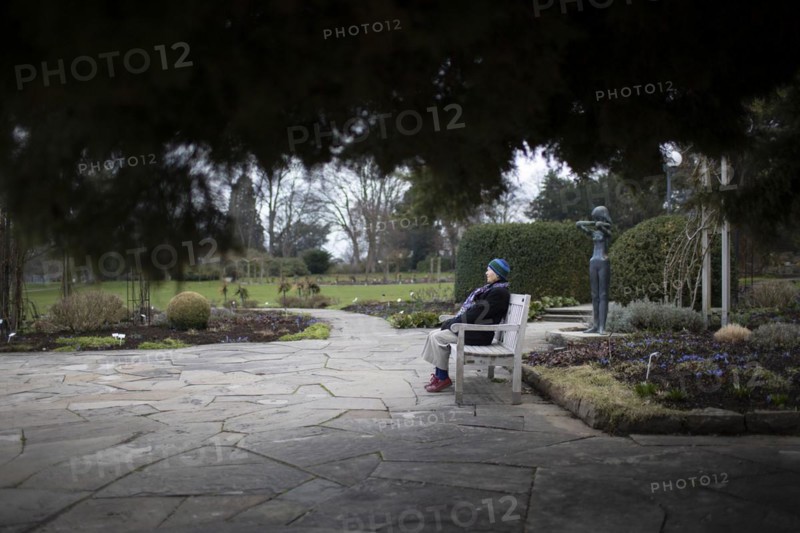 Subject: Pensioner on a park bench in Westfalenpark in Dortmund