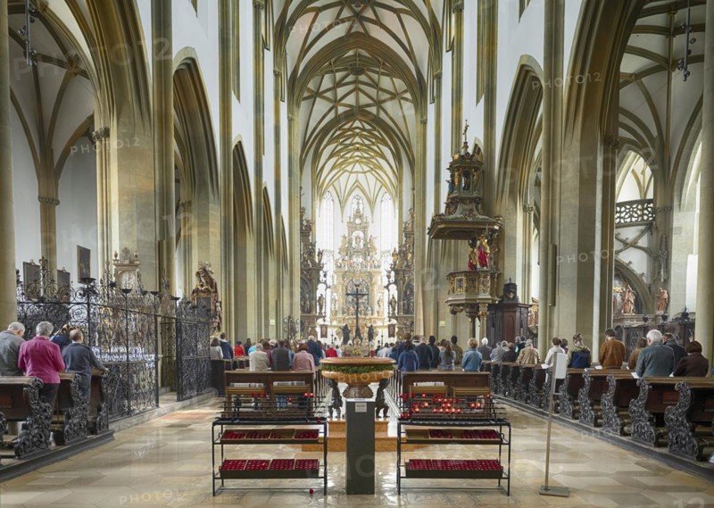Church service in the Basilica of St. Ulrich and Afra