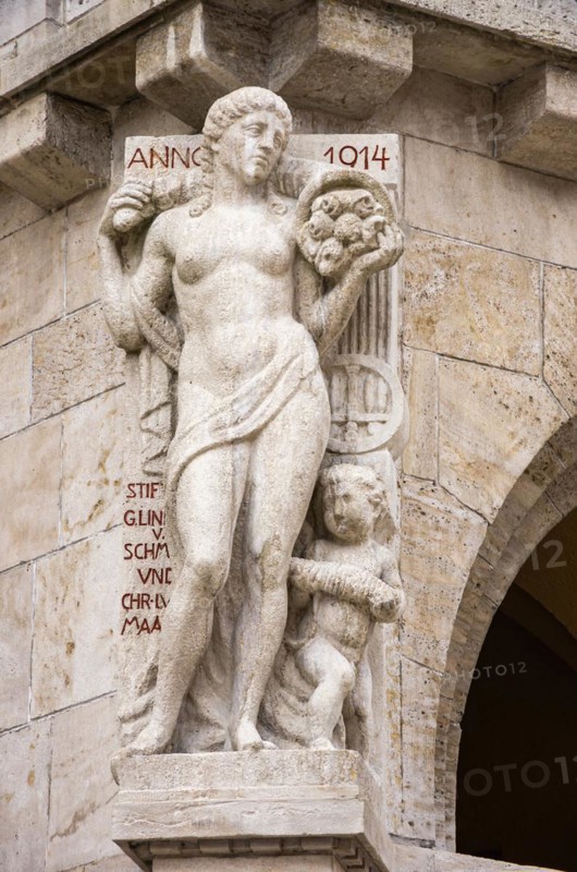 Donated figure from 1914 as ornamental element of the town hall built in reform style
