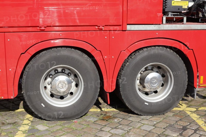 Wheels and tyres on a red Mercedes truck