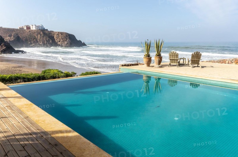 Infinity swimming pool overlooking Atlantic Ocean