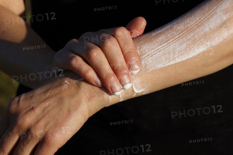 Applying sunscreen