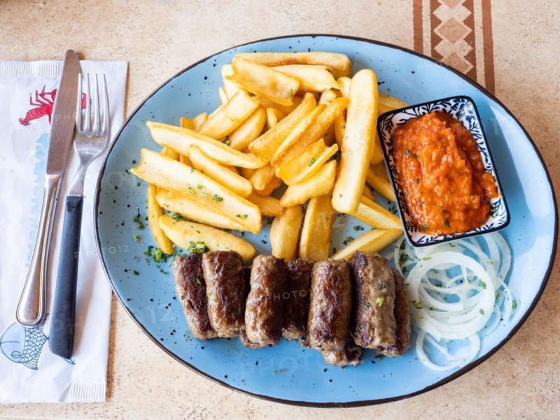 Typical local cevapcici grill plate