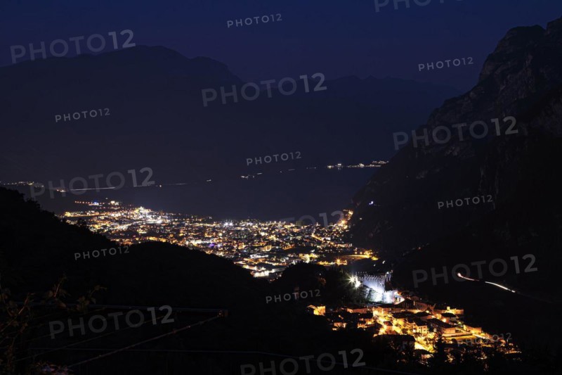 The town of Riva del Garde at night on Lake Garda in the municipality of Riva del Garda Trentino Northern Italy Europe