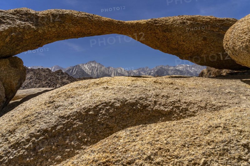 View through the Lathe Arch to the Sierra Nevada with Lone Pine Peak and Mt