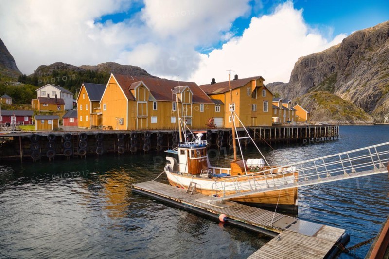 Historic buildings and fishing boats in Nusfjord harbour