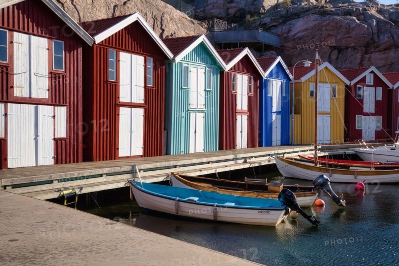 Fishing boats and colourful boathouses in the harbour of Smögen