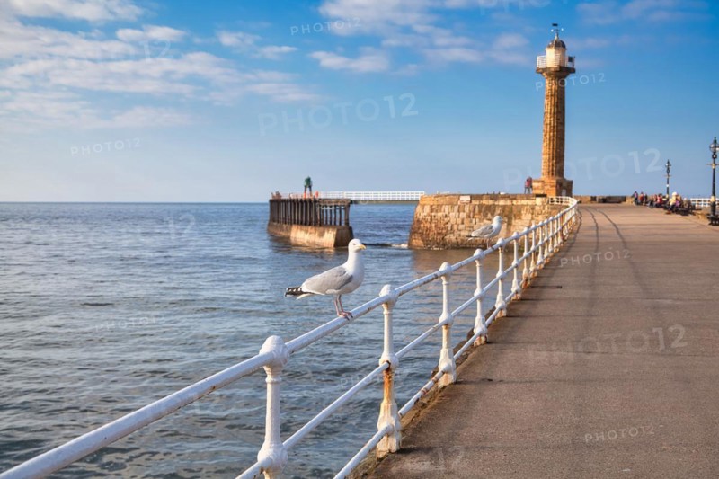 Pier with 19th century stone lighthouse
