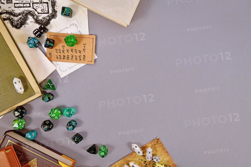 Tabletop roleplaying flat lay with RPG and game dices