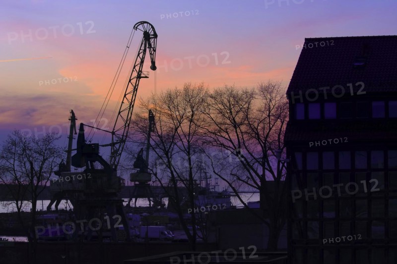 Silhouettes of port crane