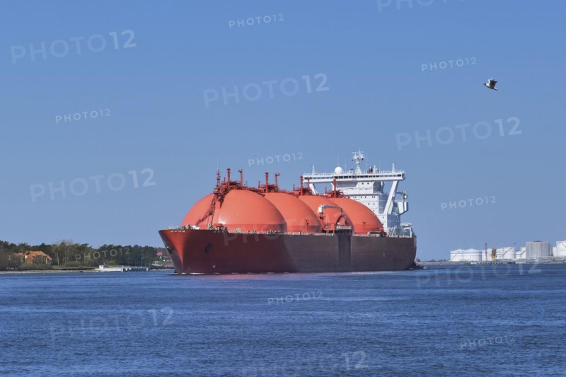 LNG or liquified natural gas tanker entering port on a sunny day in Klaipeda