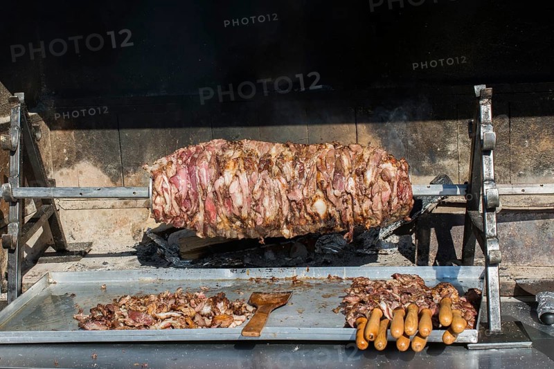 Turkish cag Kebab on pole in horizontal position