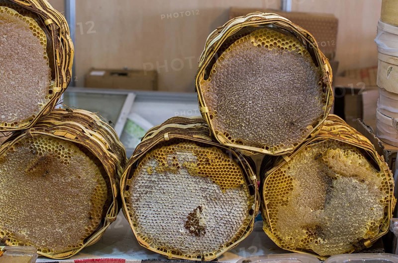 Sweet fresh honey in the sealed comb frame