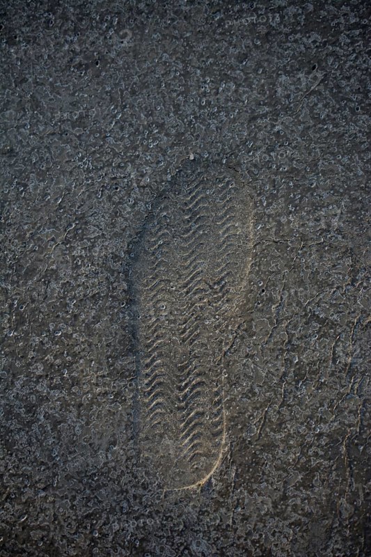 Footstep pattern seen on a concrete background