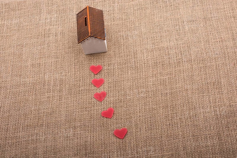 Model house and a heart shape beside it