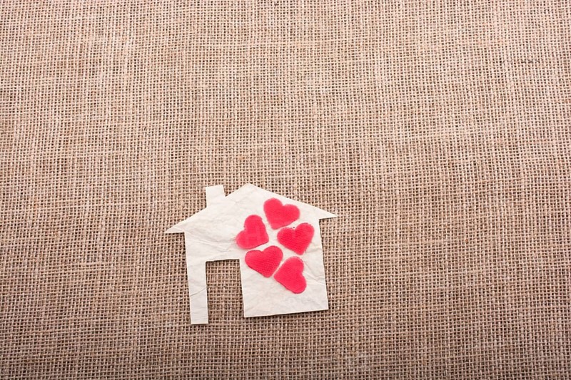 Model house and a heart shape beside it