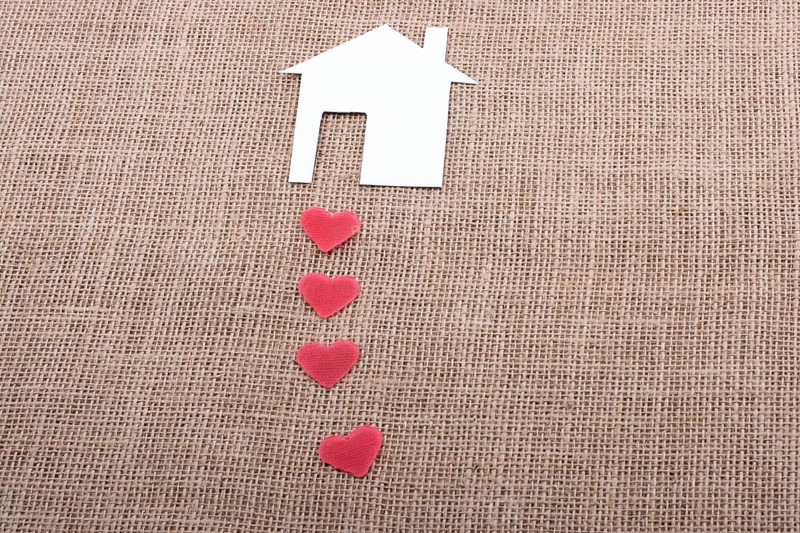 Model house and a heart shape beside it