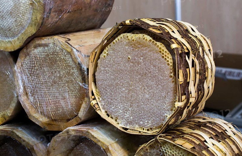 Sweet fresh honey in the sealed comb frame