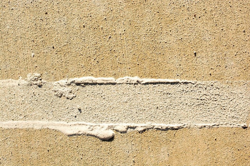 Tire tracks tire marks on Concrete as abstract grunge texture