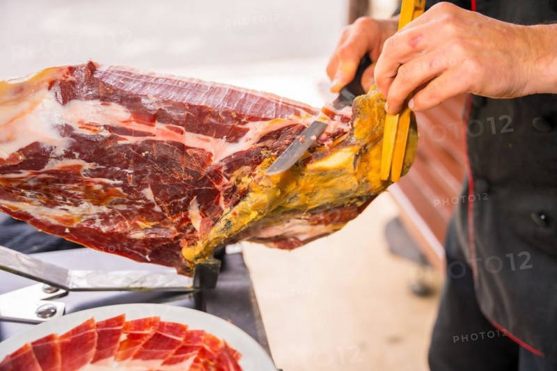 Iberian ham cutter man