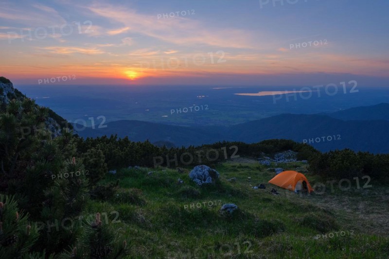 Camping on a mountain meadow in the evening light