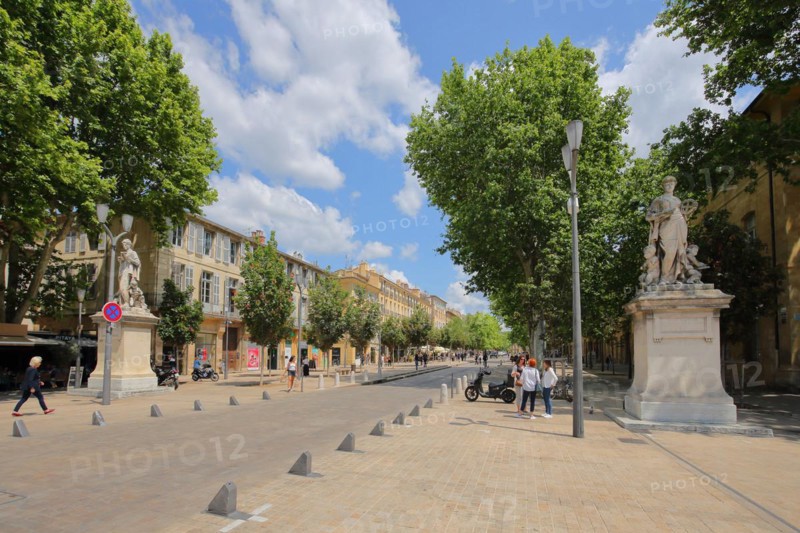 Famous Cours Mirabeau Boulevard with two statues