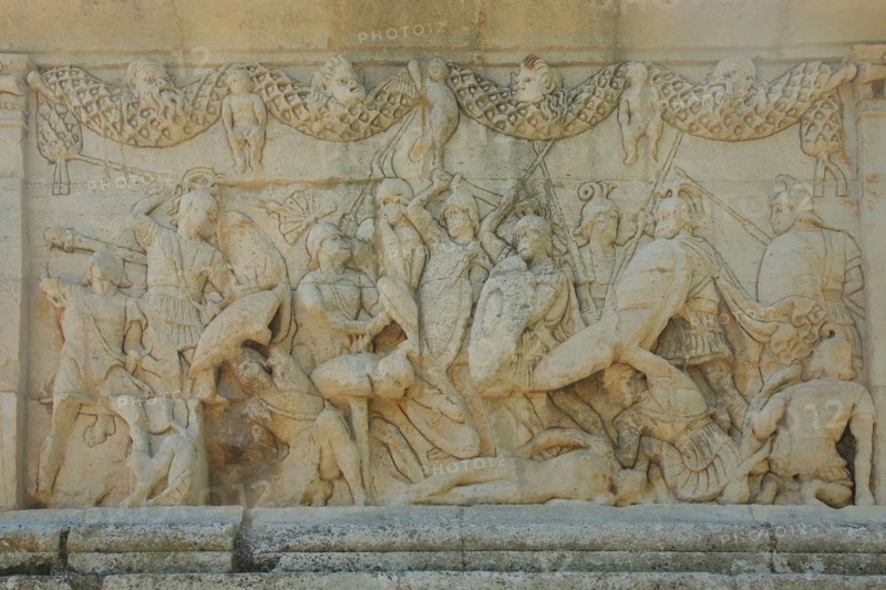 Relief in stone with battle scene