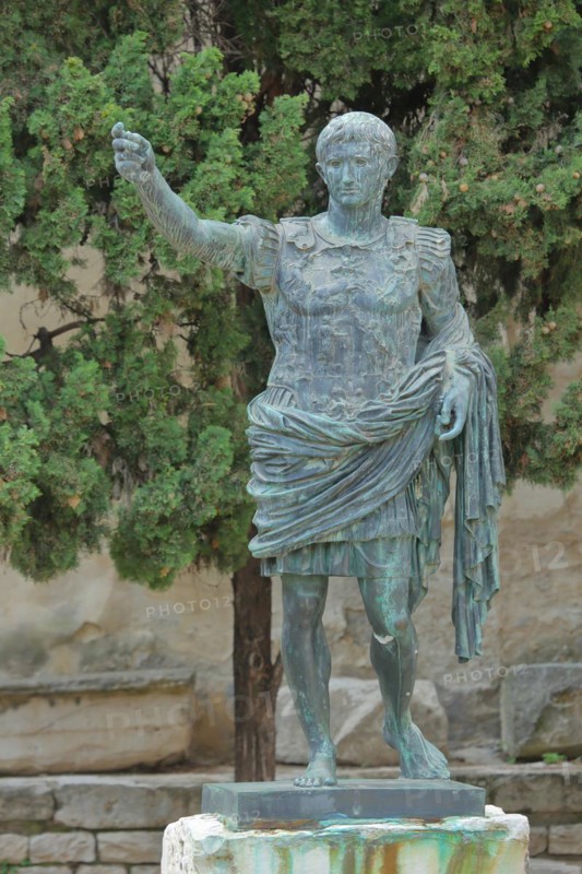 Statue of the 1st Roman Emperor Augustus at the archway Porte d'Auguste