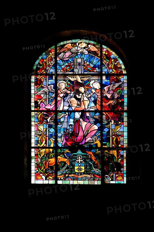 Stained glass window with Our Lady