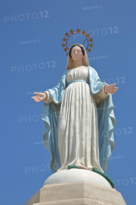 White statue of Our Lady with crown and halo