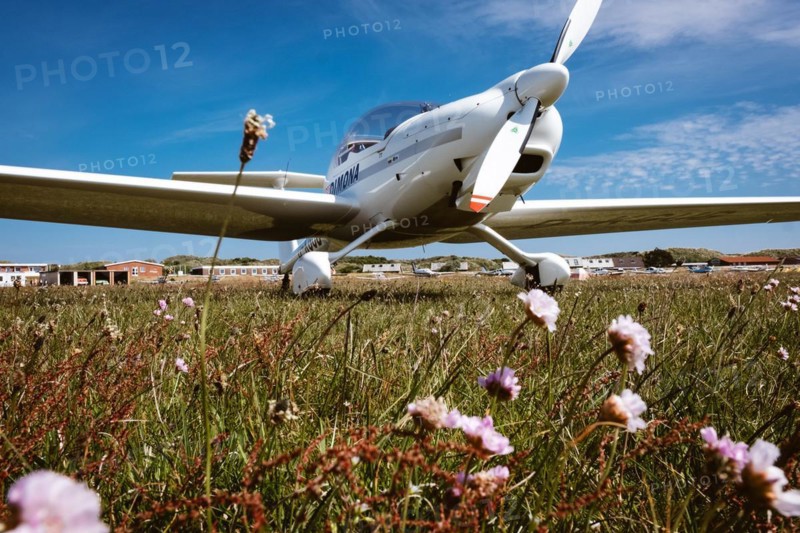 Motor glider Super Dimona HK 36 on the airfield of the island of JuiSt East Frisia