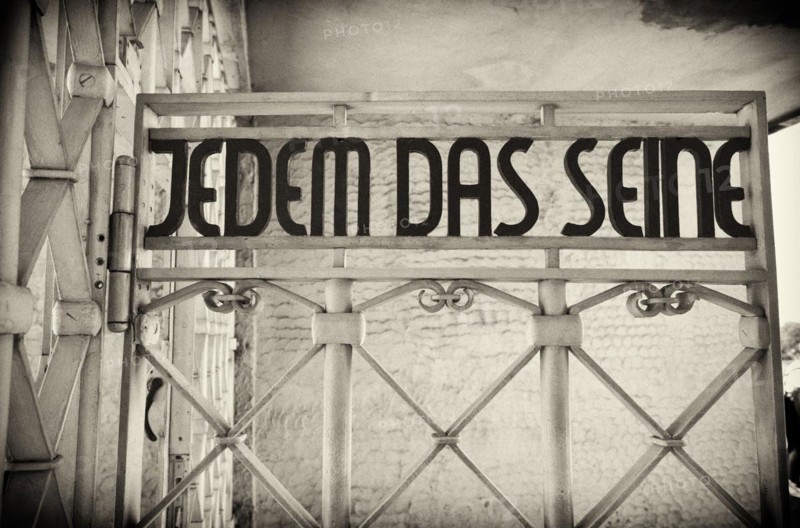 Entrance gate to beech forest concentration camp with the saying JEDEM DAS SEINE in Bauhaus script by Franz Ehrlich