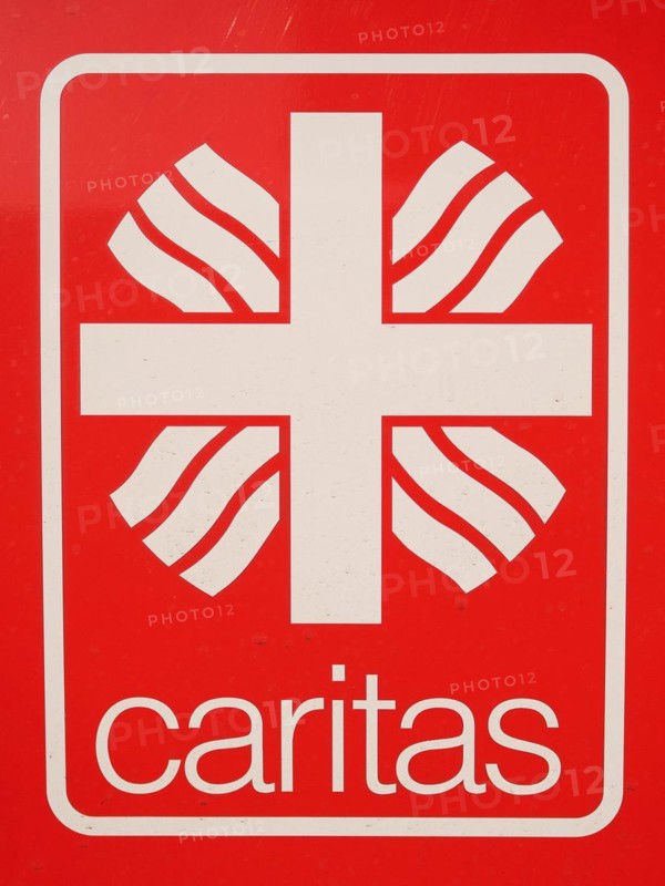 Sign with inscription Caritas